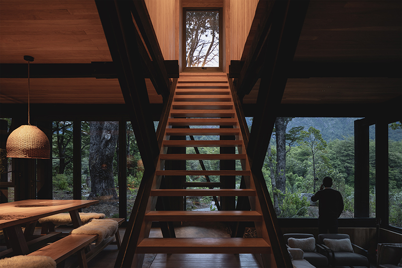 transparent below and sheltered on top, Eugenio Simonetti's KW house sits amid forest in chile