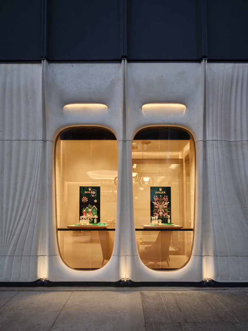 partisans sculpts parametric limestone facade with sinuous curves at toronto rolex boutique