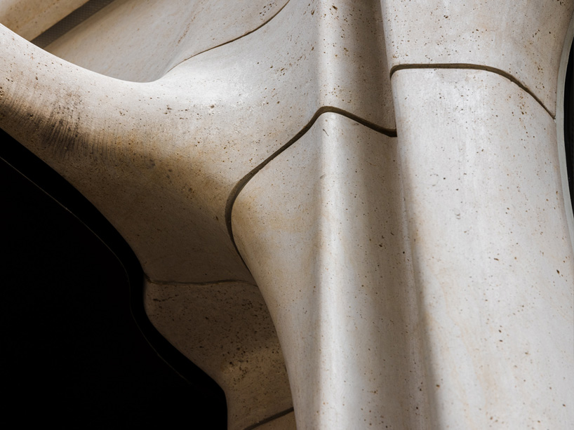 partisans sculpts parametric limestone facade with sinuous curves at toronto rolex boutique