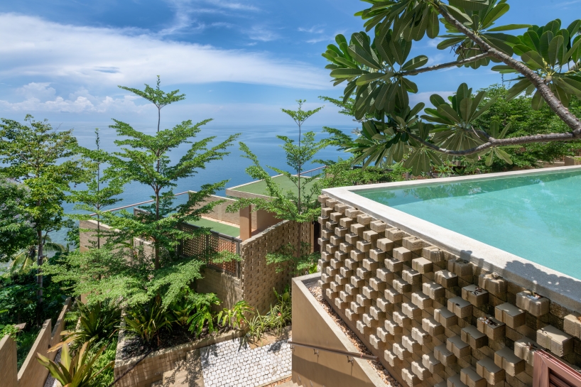 SLIC scatters cluster of brick and limestone villas 70 meters above philippines coastline