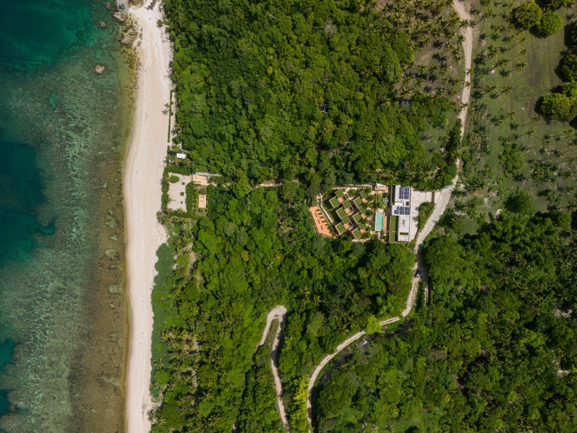 SLIC scatters cluster of brick and limestone villas 70 meters above philippines coastline