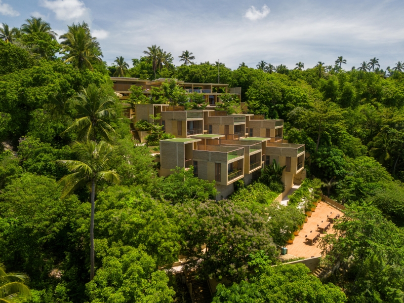SLIC scatters cluster of brick and limestone villas 70 meters above philippines coastline