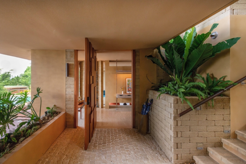 SLIC scatters cluster of brick and limestone villas 70 meters above philippines coastline