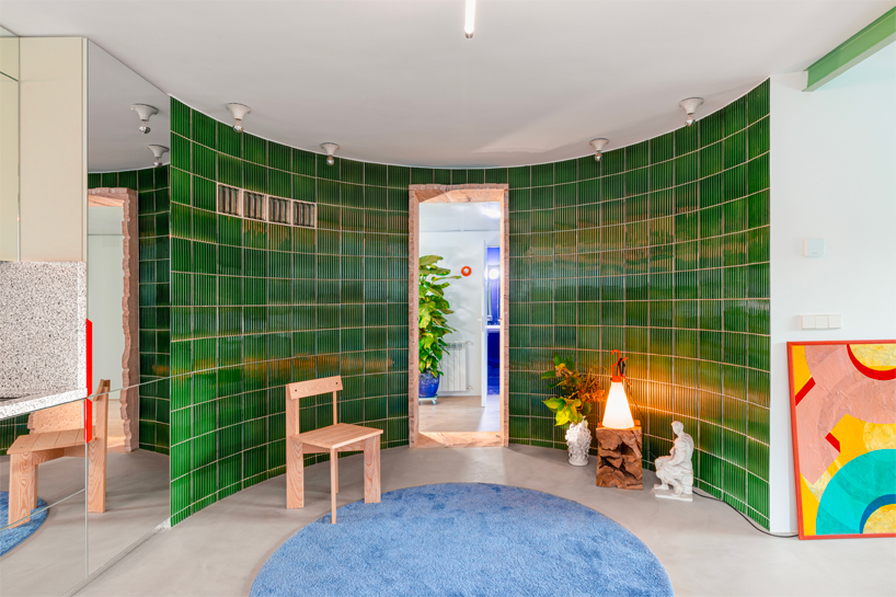 curved ceramic wall reforms 1966 apartment's conventional domestic layout in spain - 2