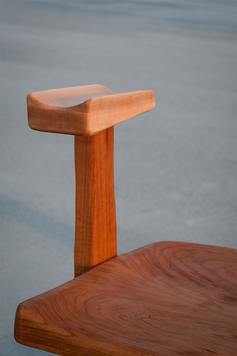 organic contours and asymmetric forms carved from cherry and maple wood define buttonback chair - 1