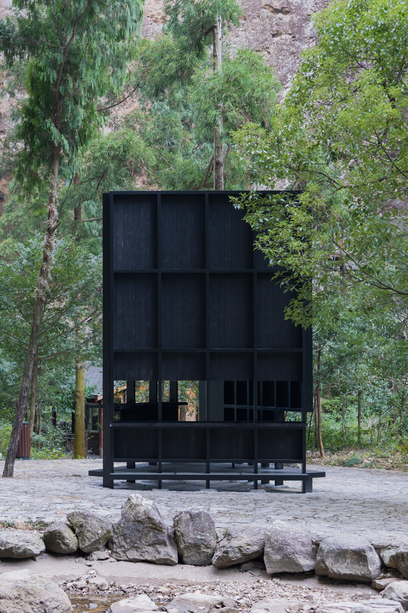 rain apparatus of aptdotapt's wooden pavilion in china inverts eaves, bringing water inside