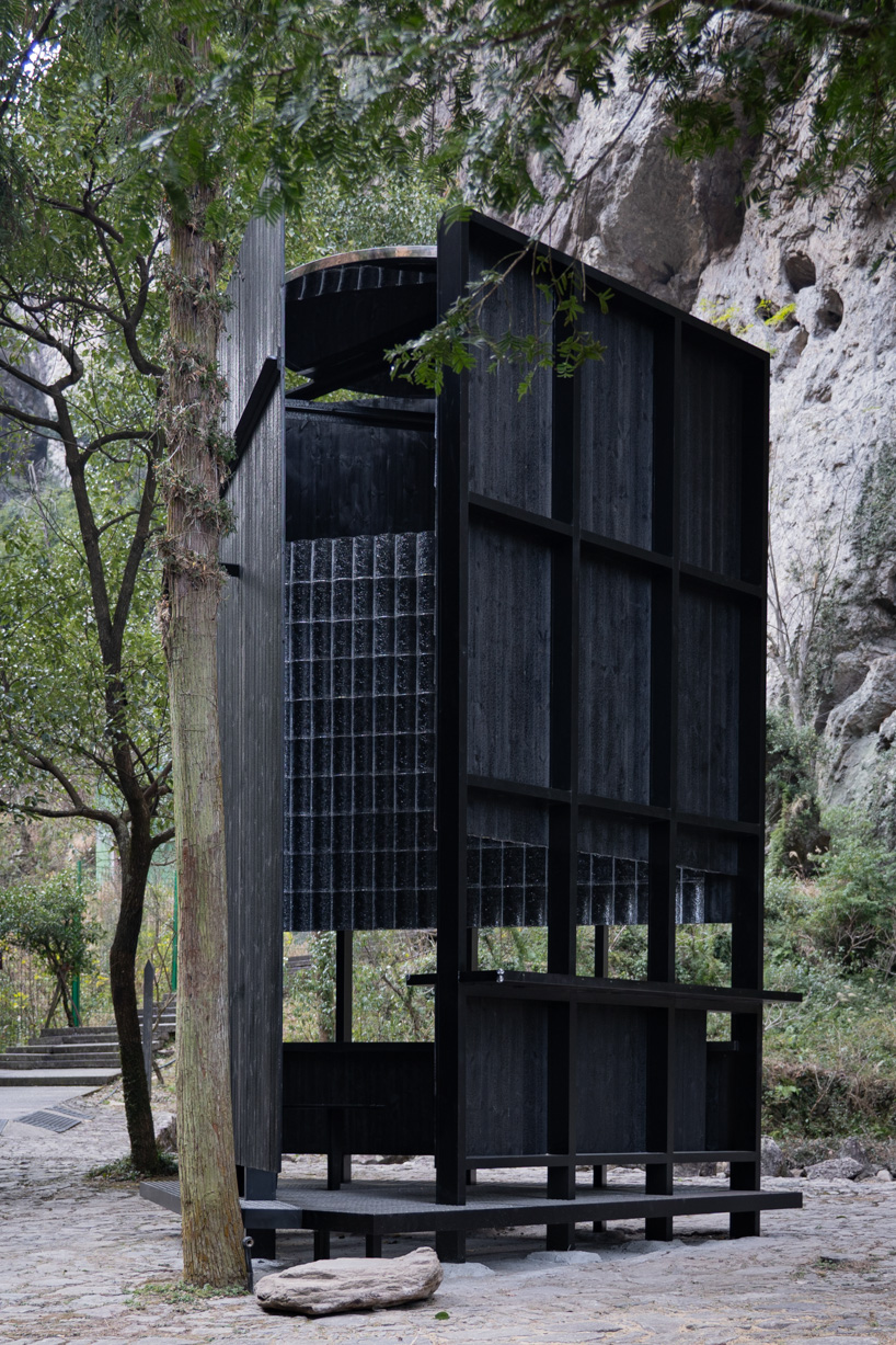 rain apparatus of aptdotapt's wooden pavilion in china inverts eaves, bringing water inside