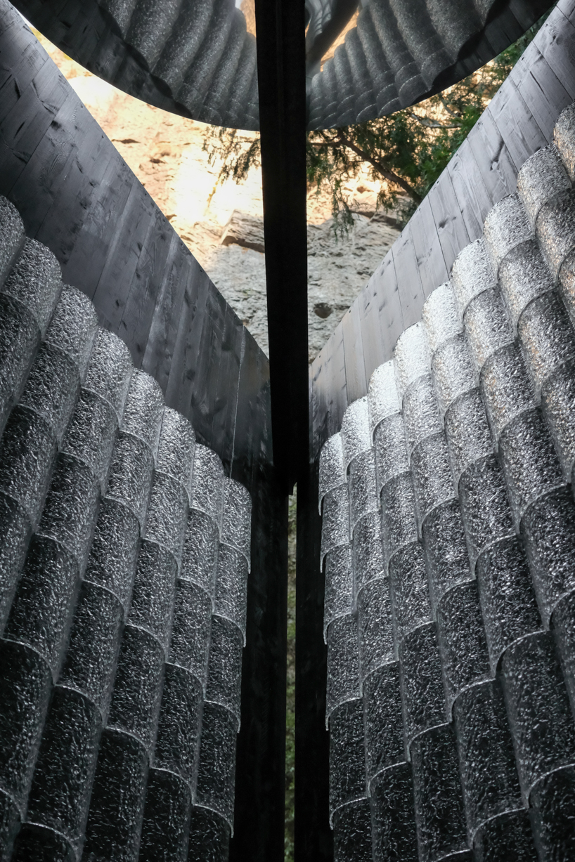 rain apparatus of aptdotapt's wooden pavilion in china inverts eaves, bringing water inside
