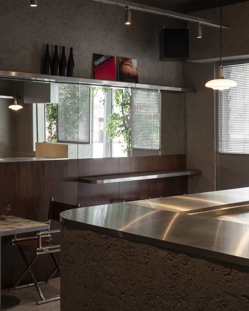 formant studio layers brutalist textures and local design at marne café in mexico city