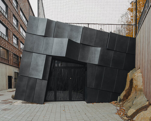 erdegard arkitekter carves ‘mountain chamber’ threshold to rock cavern in sweden