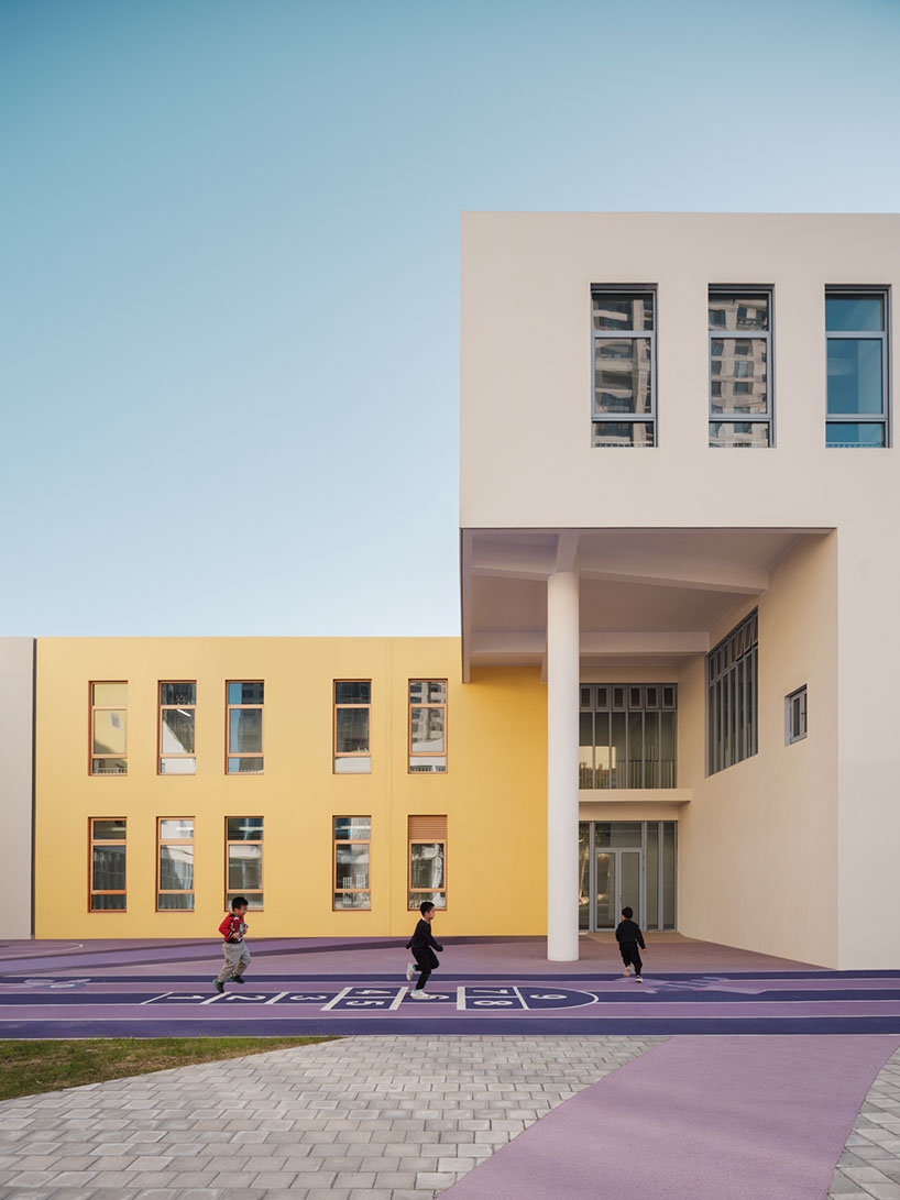 stacked color blocks and layered courtyards form a modular castle-like kindergarten in china - 6
