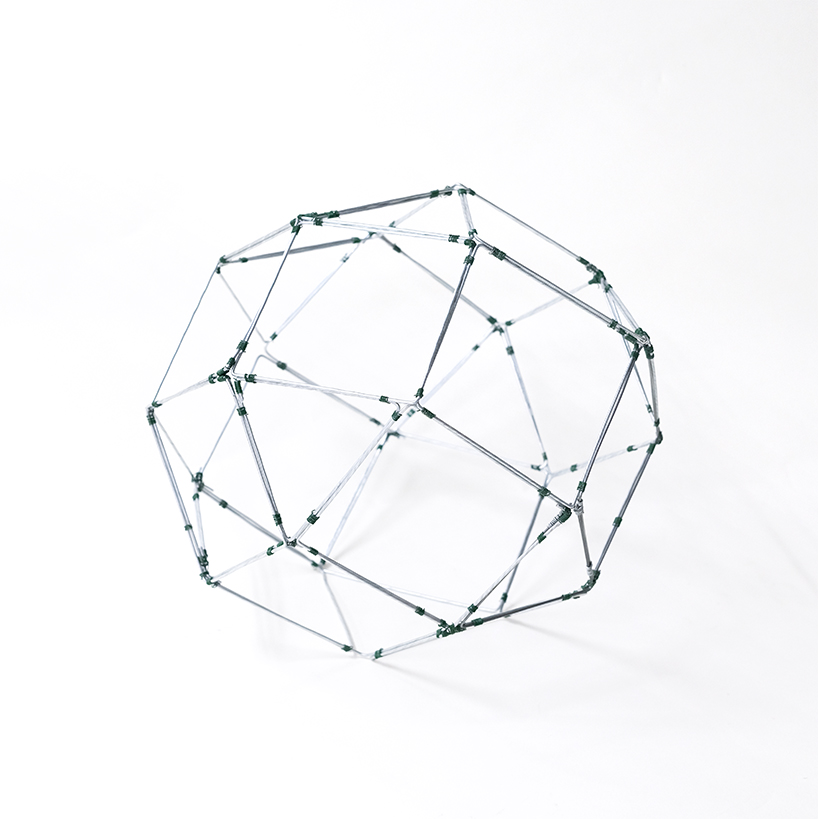 pleated fabric shapes aoi’s structural lighting form - 4