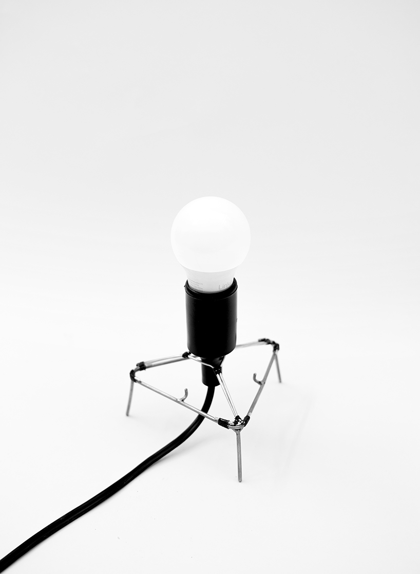 pleated fabric shapes aoi’s structural lighting form - 6