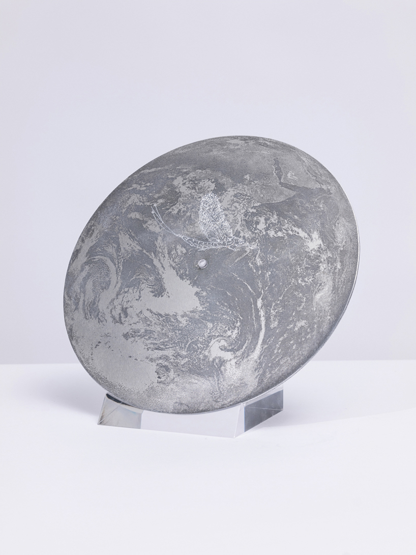 a reflective metal record maps sonic memory across time and space - 3