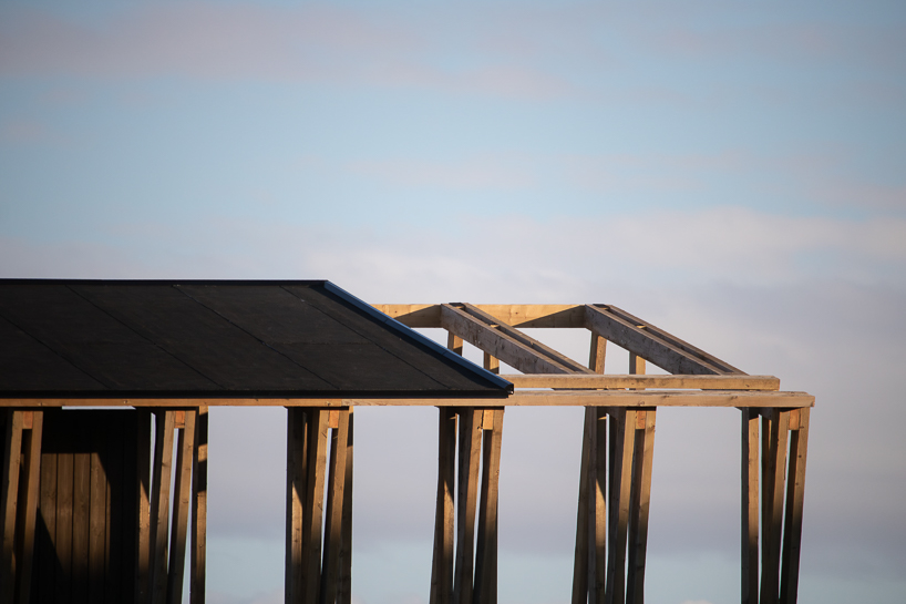a timber ships hull becomes a community sauna on norways arctic coast 4