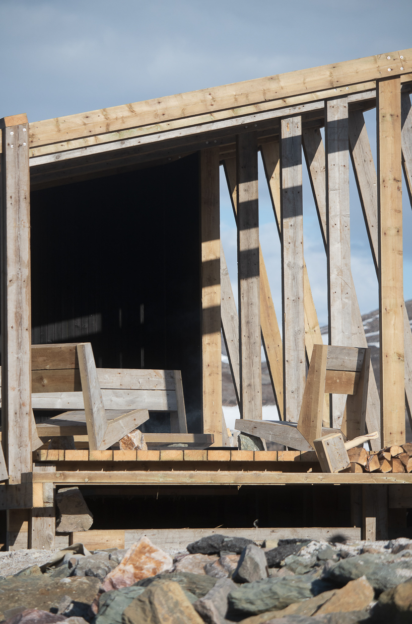 a timber ships hull becomes a community sauna on norways arctic coast 7