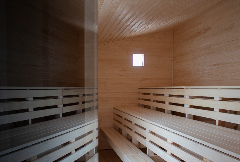 a timber ships hull becomes a community sauna on norways arctic coast 8