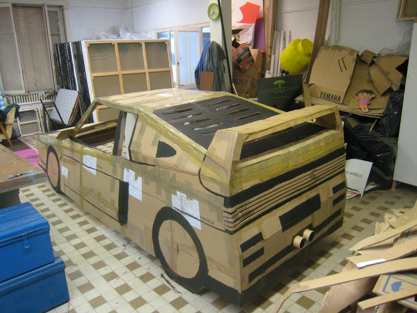 benedetto bufalino transforms a car into a cardboard ferrari