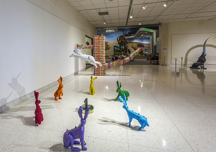 herb williams sculpts technicolor animals using thousands of crayons