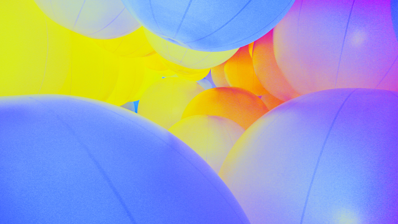 luminous colored spheres by team lab respond to human touch