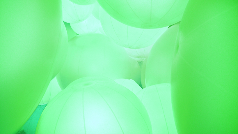 luminous colored spheres by team lab respond to human touch