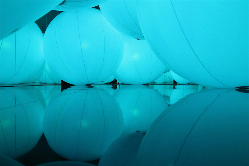 luminous colored spheres by team lab respond to human touch