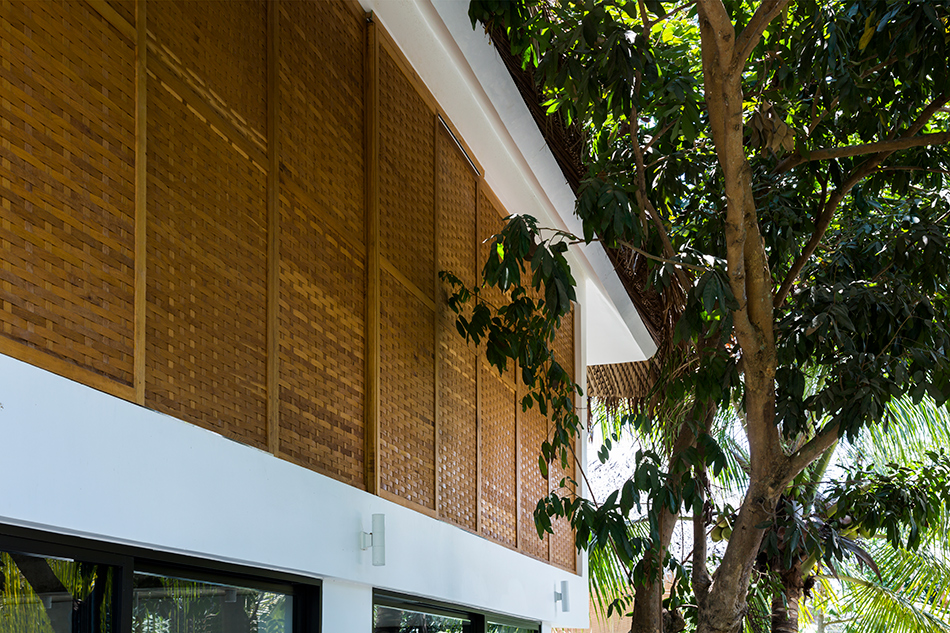 MM++ architects tropical holiday house woven sliding panels vietnam designboom
