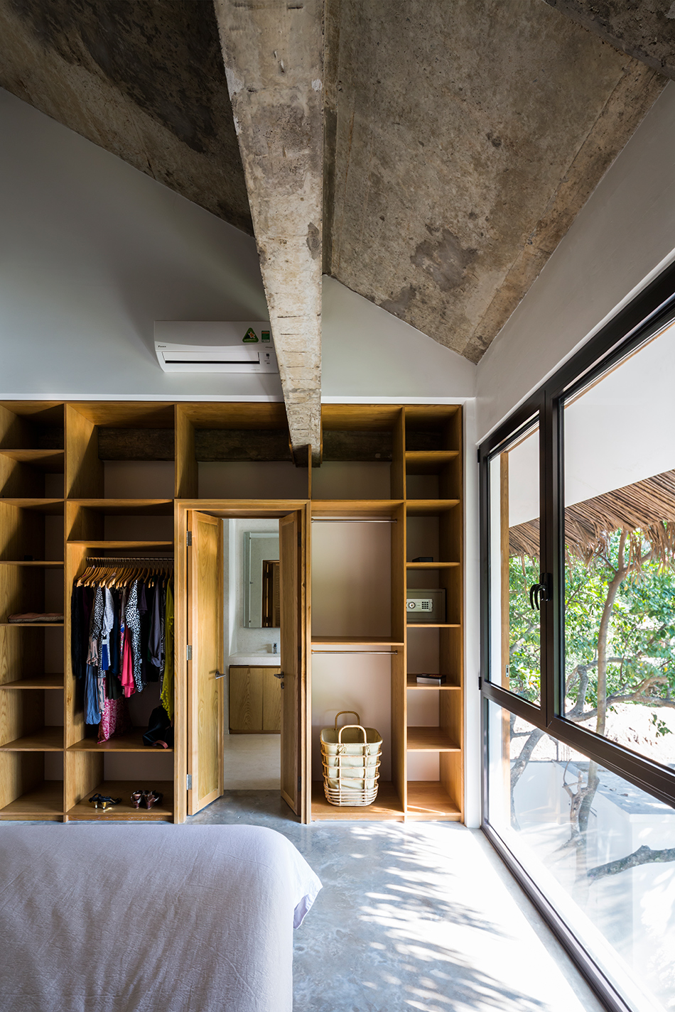 MM++ architects tropical holiday house woven sliding panels vietnam designboom