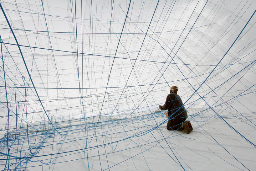 numen/for use installs inhabitable string sculpture inside inflatable bubble