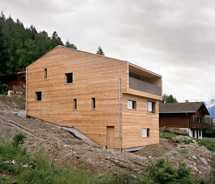 Wooden House On The Slope By Lx1 Architects