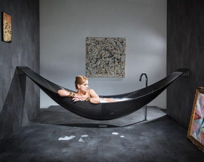 a hammock-shaped carbon fibre bathtub by splinter works