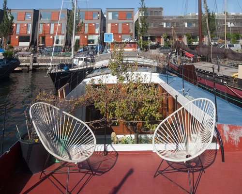 BBVH overhauls belgian barge into airy amsterdam houseboat