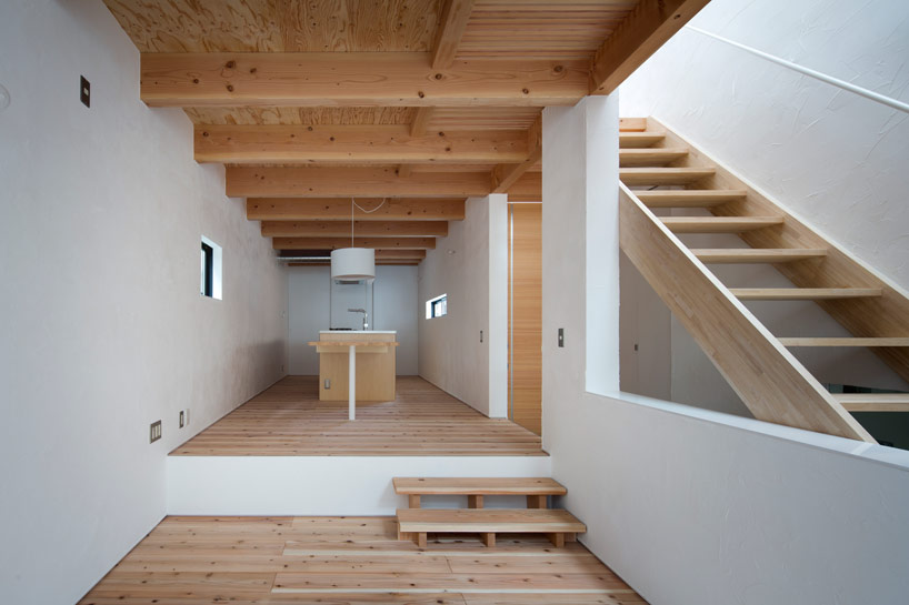 Container design aligns axial house of shimamoto-cho