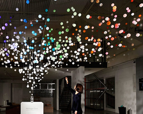emmanuelle moureaux bursts sparkling bubbles from coca-cola