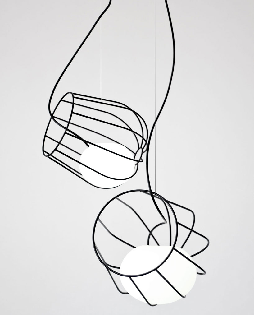 martin-azua-light-container-designboom01 martín azúa suspends dipping metallic basket in light container - 3