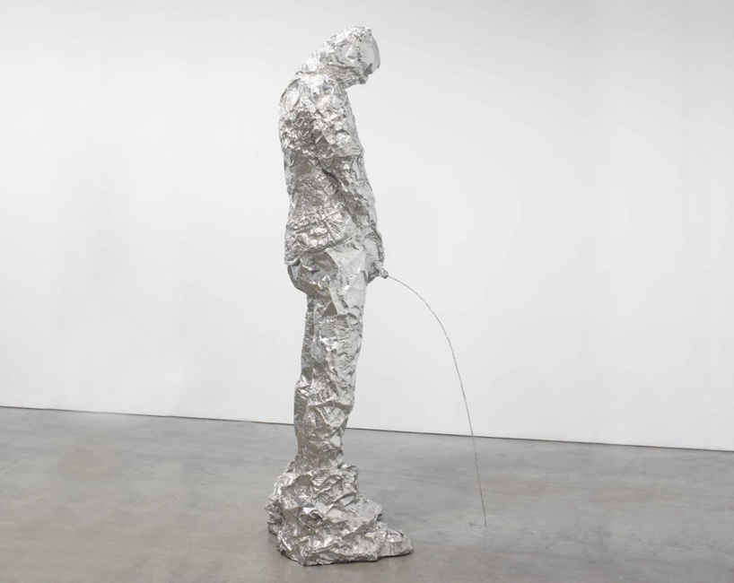 tom friedman sculpts a peeing figure from foil