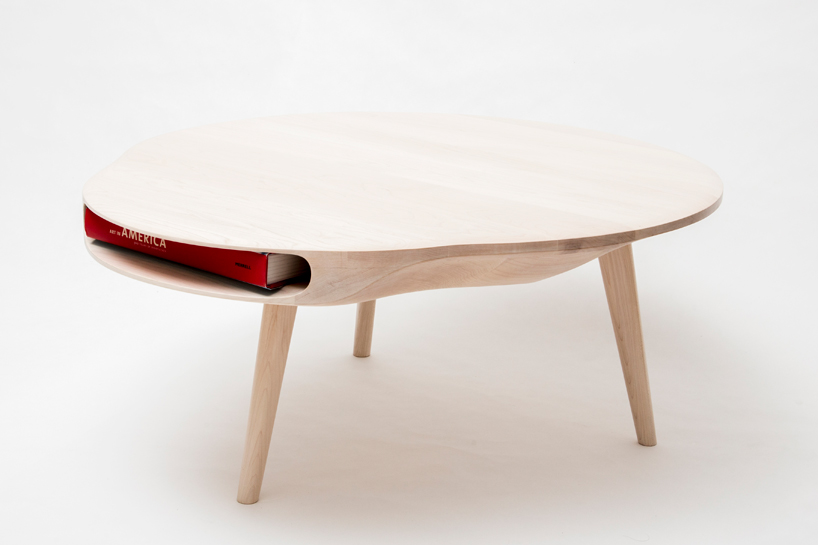 tokyo table by loic bard features discreet storage compartment