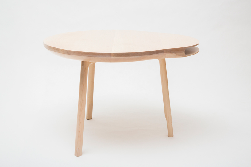 tokyo table by loic bard features discreet storage compartment