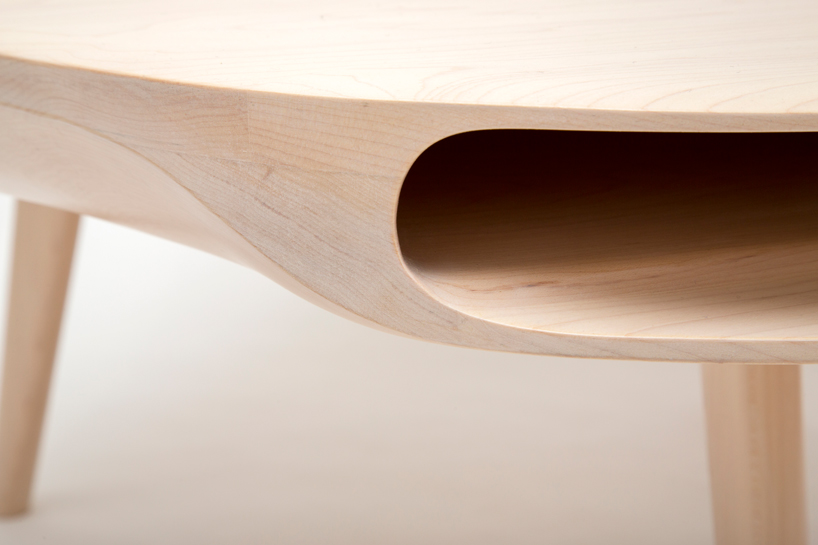 tokyo table by loic bard features discreet storage compartment