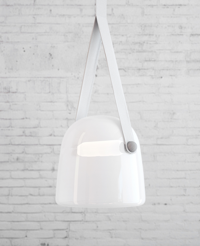 mona lamp by lucie koldova for brokis suspends with lanyards