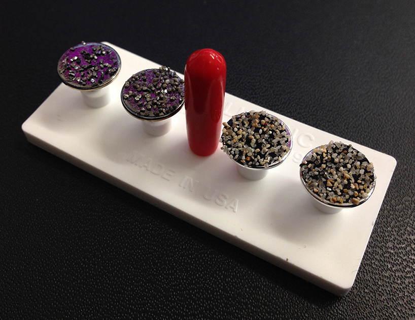 vik muniz + marcelo coelho etch sandcastles on grains of sand