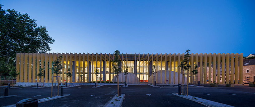 opus 5 architectes media library designboom