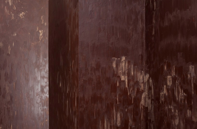 anya gallaccio assaults the senses with edible dark chocolate room