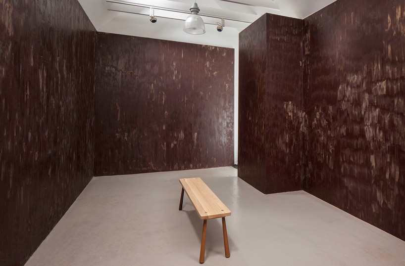 anya gallaccio assaults the senses with edible dark chocolate room