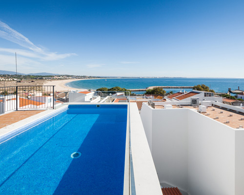 collective housing by vitor vilhena arquitectura revamps city block in portugal
