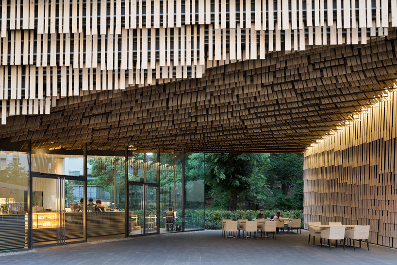 kengo kuma clads campus building with layered timber slats