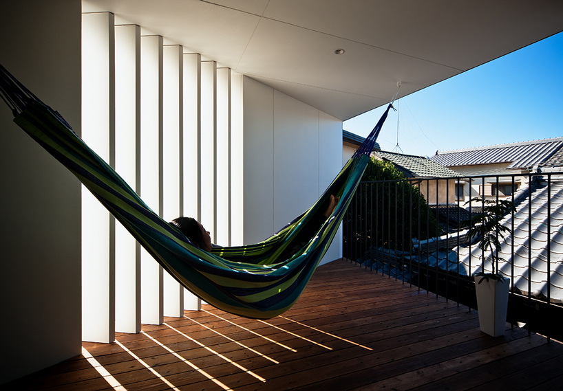 UZU architects hammock house designboom