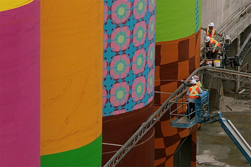 os gemeos colorizes six giant silos on vancouver's granville island