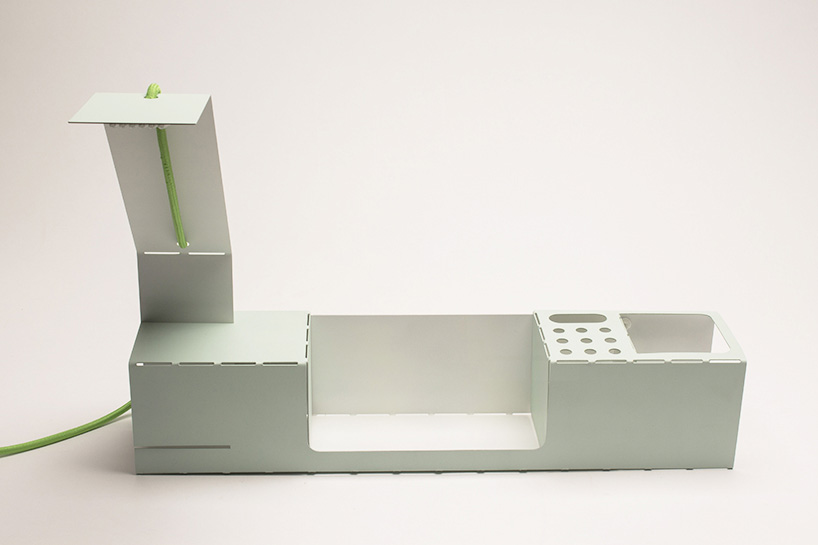 a folded, durable, lightweight, laser cut desk organizer