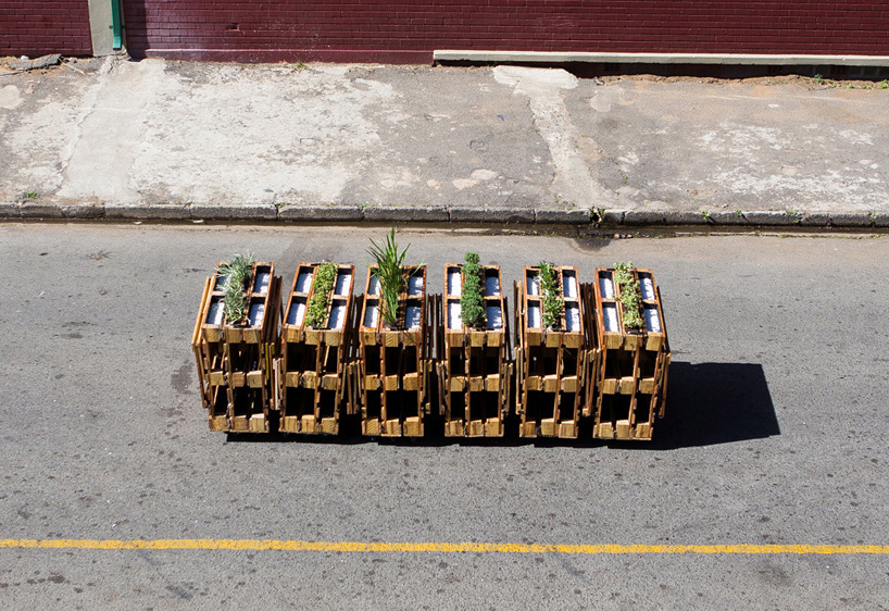 r1 recycles wooden pallets into interlocking mobile benches for johannesburg